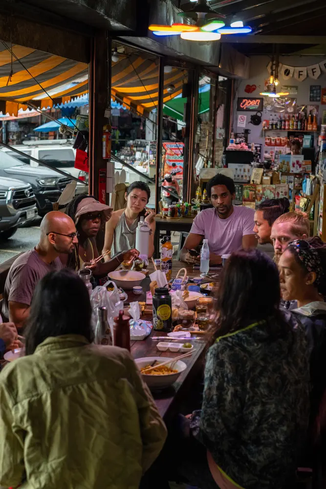 A long street-side dinner with the food track