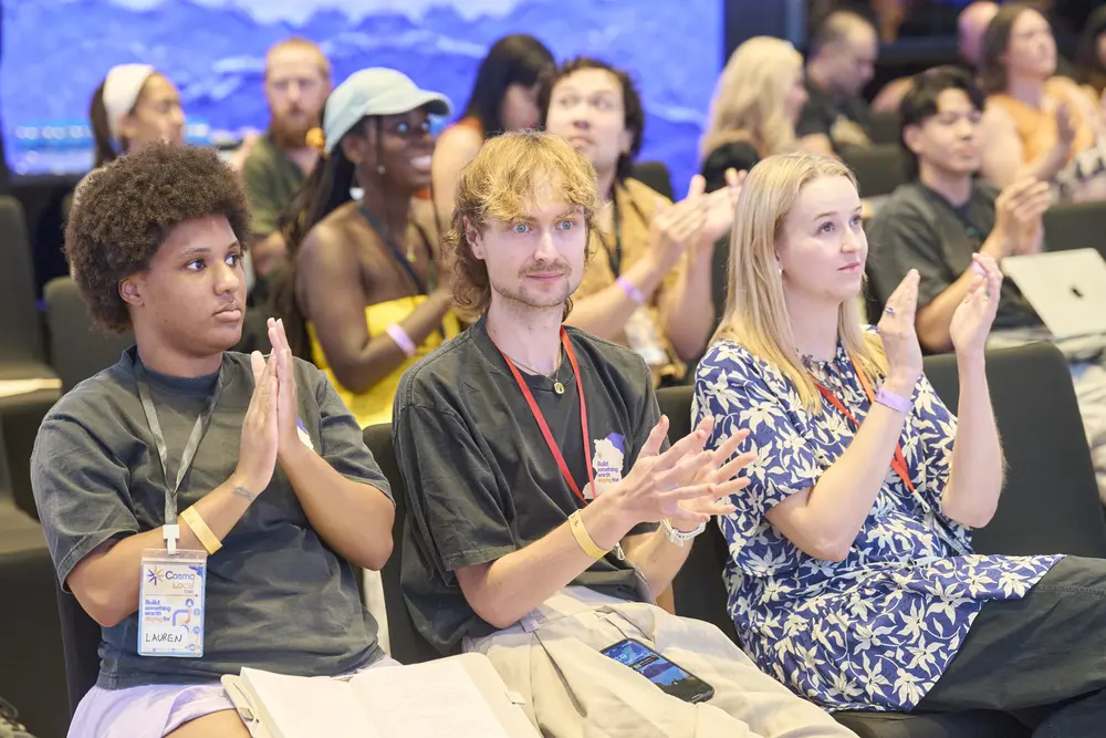The keynote audience applauding