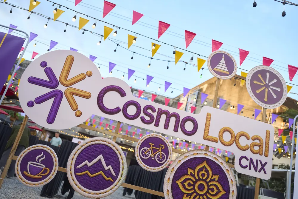 The Cosmo Local sign at the opening night market